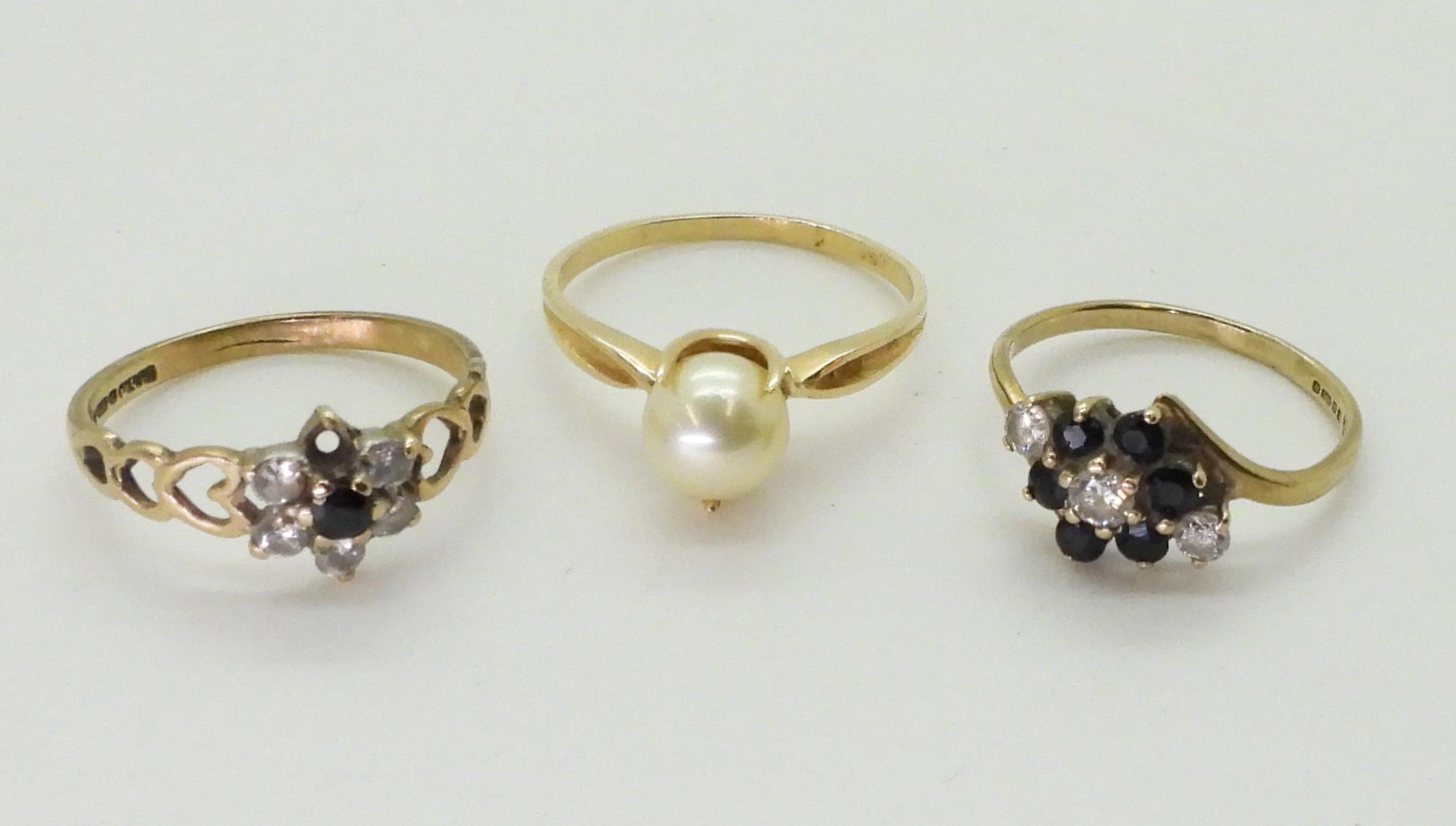 A yellow metal pearl set ring, size O, together with two 9ct gold sapphire and clear gem set - Image 2 of 2