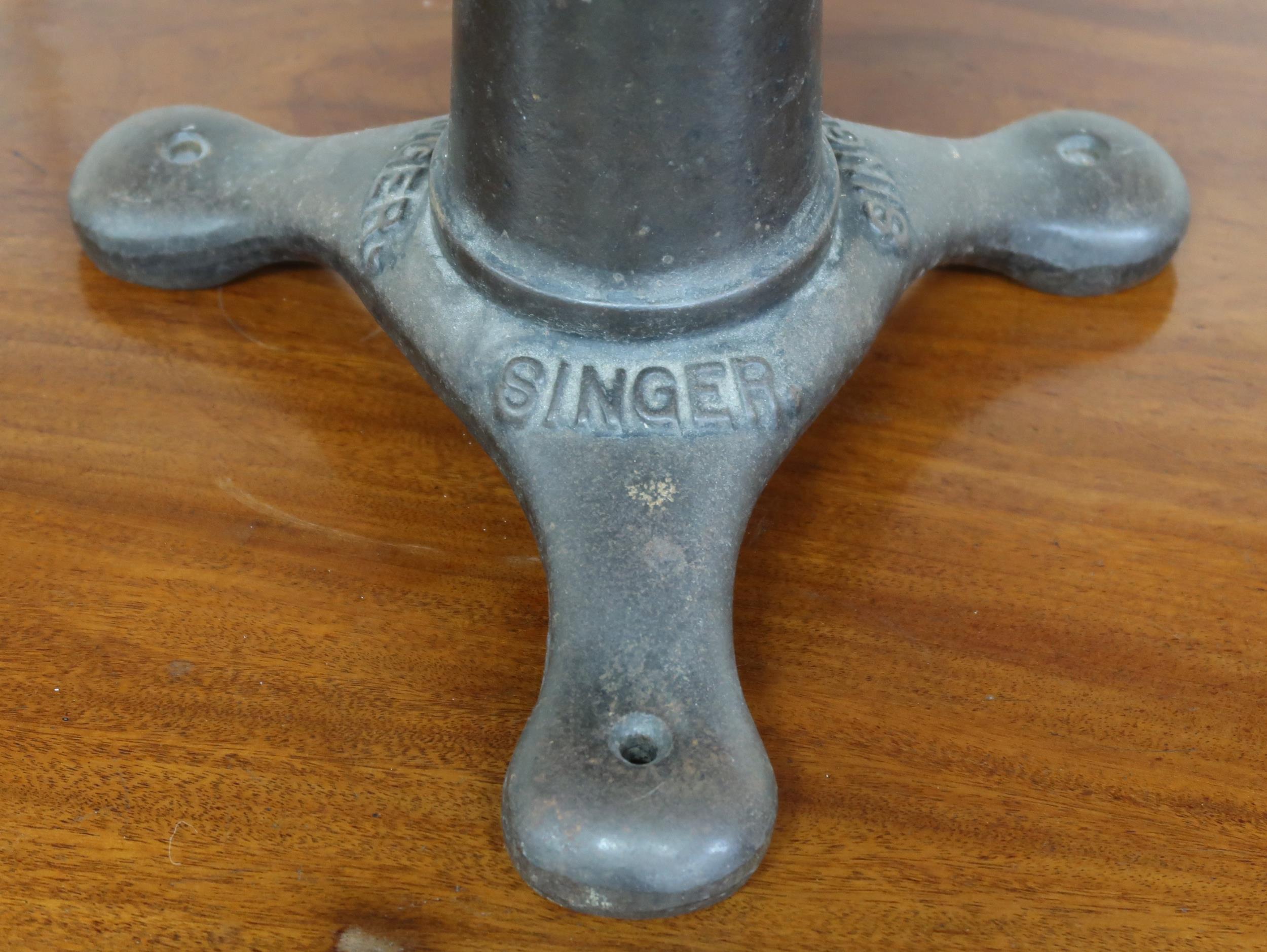 An early to mid 20th century Singer machinists stool converted to a sculpture stand, 49cm high x - Image 2 of 4