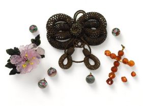 A plaited hair mourning brooch, five Murano glass buttons, an amber cross (af) and a rose quartz and