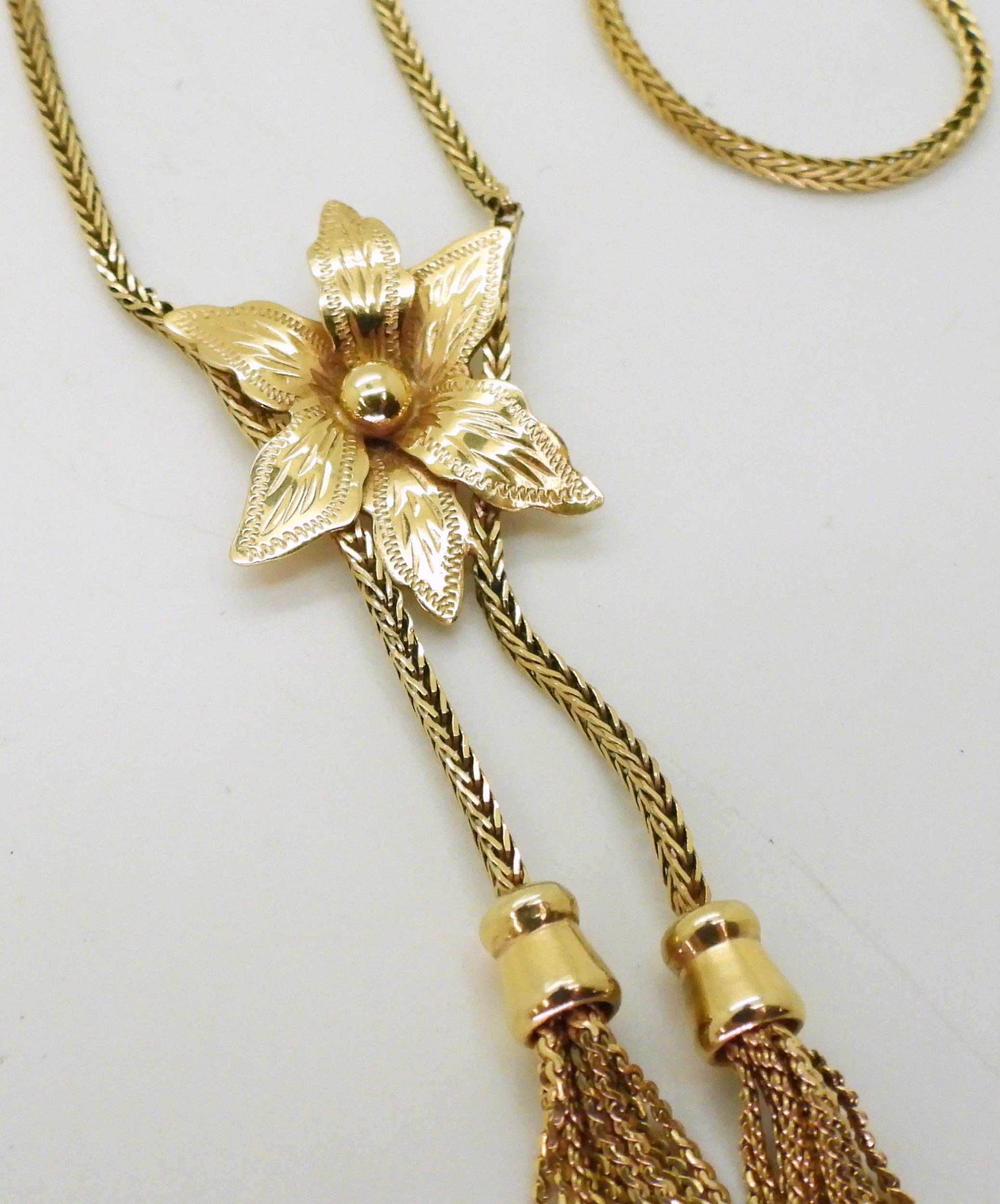 A 9ct gold herringbone chain and flower necklace, length 43.5cm, weight 12gms Condition Report: - Image 3 of 5