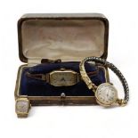 An 18ct gold ladies vintage watch head, weight including strap and mechanism 14.2gms, together
