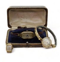 An 18ct gold ladies vintage watch head, weight including strap and mechanism 14.2gms, together
