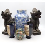 A pair of Malaysian hardwood fo dogs, a pair of Satsuma vases, a Japanese blue and white vase and