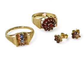 A 9ct gold retro garnet cluster ring, size M1/2, and a pair of garnet earrings, together with a blue