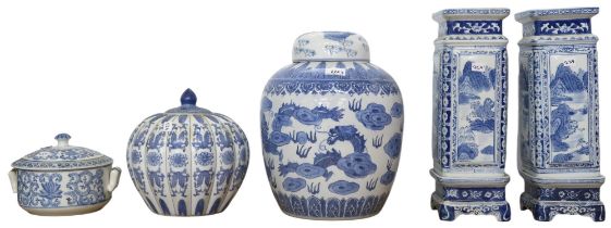 A pair of Chinese blue and white vases on stands, a ginger jar, a tureen and cover and a lidded