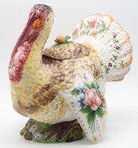An Italian pottery Turkey shaped soup tureen, painted with flowers Condition Report:Available upon
