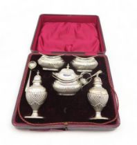 An Edwardian cased silver five piece cruet set, by Joseph Gloster, Birmingham 1907, the bodies