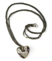 A silver Georg Jensen spiral heart pendant and chain, both the pendant and chain are stamped with