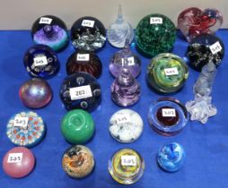 A collection of glass paperweights including a millefiori example dated 78, Caithness, Selkirk