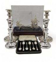 An Indian white metal filigree horse and chariot, in perspex case, and a set of silver teaspoons, by