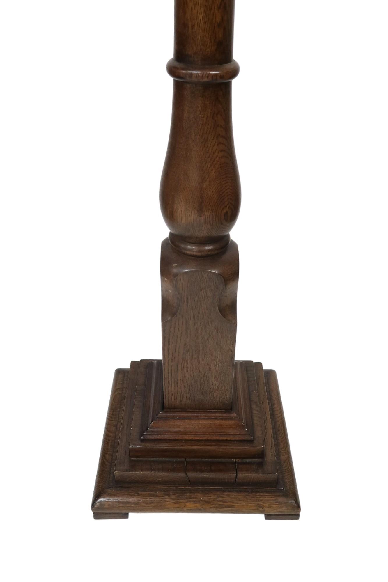 An early 20th century stained oak coat stand with turned finial top over four revolving pegs (one - Image 3 of 4