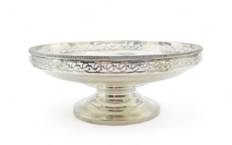 A George V silver fruit bowl, by Docker & Burn, Birmingham 1923, with a scrolling openwork border,