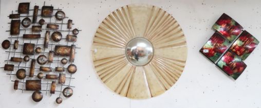 A lot of three assorted 20th century wall art pieces consisting circular metal and glass wall