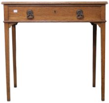 A Victorian oak single drawer side table on square tapering supports, 72cm high x 75cm wide x 52cm
