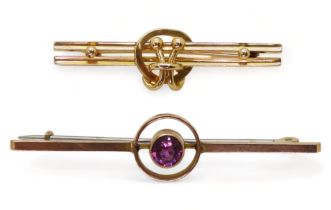 A 9ct gold brooch, set with a solitaire pink gem, weight 2.7gms, together with a further yellow