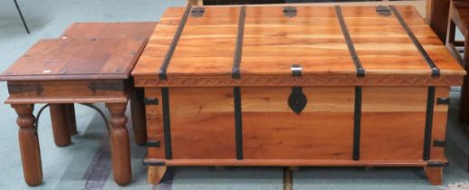 A lot comprising a large contemporary mangowood chest/coffee table with black metallic fittings,