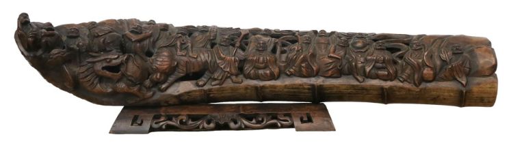 A large carved bamboo sculpture, decorated with figures  and a dragon Condition Report:Available