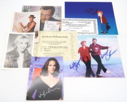 AUTOGRAPHS A colour photograph of Debbie Reynolds and Donald O'Connor, stars of Singin' in the