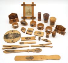 A collection of Mauchline ware depicting English views, to include Cromer Hall, Norfolk; Rocks and