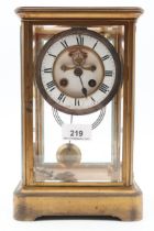 A French brass and glass clock Condition Report:Does not wind, needs some TLC