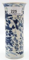 A Chinese blue and white vase decorated with figures standing beside a large urn Condition Report: