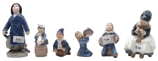 A small group of Royal Copenhagen figures including four children paying musical instruments, no's