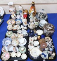 A collection of teawares, a stoneware pot and cover, a cat decorated plate and cover, and assorted