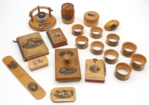 A collection of Mauchline ware depicting Scottish views, including Doune Castle, Falkland Palace,