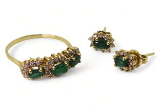 An 18ct gold emerald and diamond ring size O1/2 and matching earrings, weight together 5.1gms