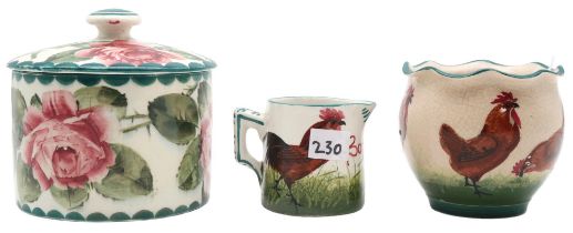 A Wemyss lidded pot decorated with cabbage roses, a Bon Jour brown Cockerel and hens jug and a