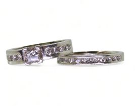A platinum wedding set made by Blair & Sheridan of Glasgow, comprising of a engagement ring set with