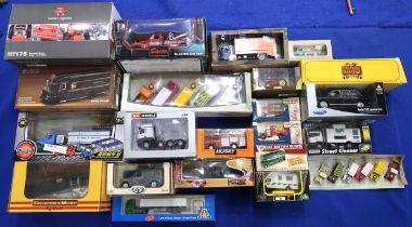Assorted model vehicles of mixed scale and manufacturer, including a large selection of agricultural