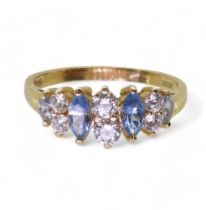 A 14ct gold ring set with blue and clear gems, size R1/2, weight 2.9gms Condition Report:Available