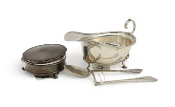An Edwardian silver sauceboat, London 1916, a pusher and feeder set, Birmingham marks, and a