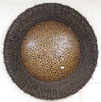 A 20th century wicker and fibreglass circular wall mounting light fixture, approximately 126cm