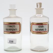 Two glass chemists or apothecary jars, one for Tinct: Serpent:, the other Ess: Sennae D:, both