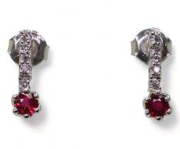 A pair of 18ct white gold, ruby and diamond earrings length 1.3cm, weight 1.8gms Condition Report: