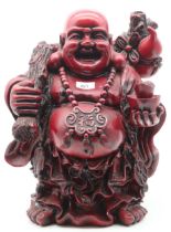 A large red resin sculpture of Buddha Condition Report:Available upon request