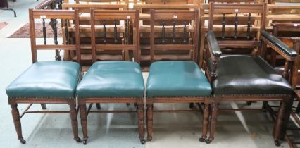 A lot of four 20th century oak chairs, one carver and three hand chairs with green vinyl upholstered