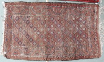 A multicoloured Kelim rug with diamond patterned ground and multicoloured border, 192cm long x 114cm