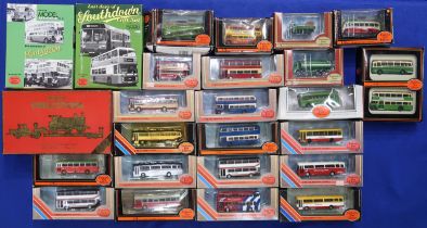 A large quantity of 1:76-scale model buses by Exclusive First Editions, with other packaged models