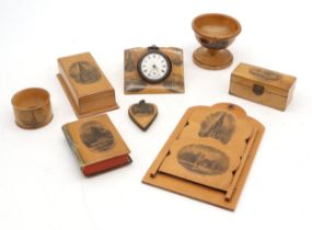 A small collection of Mauchline ware, depicting Edinburgh views, including the Castle from the