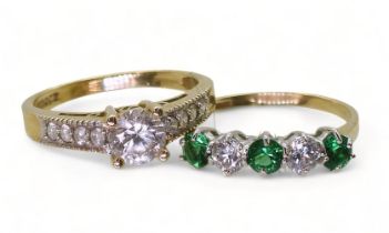 A 14ct CZ ring, size S1/2, together with a 14ct gold five-stone ring, set with clear and green gems,