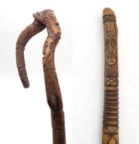 Folk Art: an interesting chip-carved hardwood staff featuring four grotesque faces amidst