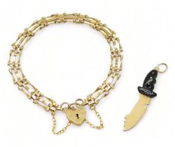 A yellow metal and black coral divers knife pendant, together with a 9ct gold gate bracelet 4.1gms