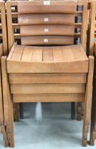 A lot of four 20th century teak stacking church seats with slatted seats on square supports, some