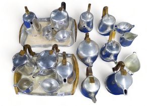 A collection of picquot ware, including two sets and additional teapots, sugar bowls, mlik jugs