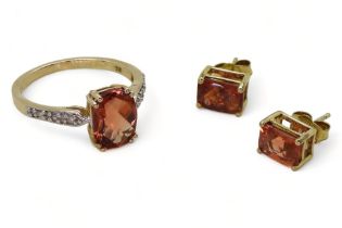 A 9ct gold padparadscha quartz and diamond cluster ring, stamped Birmingham 2011, size N1/2,