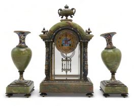A FRENCH CHAMPLEVE ENAMEL AND ONYX CLOCK GARNITURE the domed top with urn above, with four