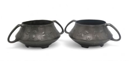 A PAIR OF ART NOUVEAU OSIRIS PEWTER TWIN HANDLED BOWLS with decoration of berries in relief,  no